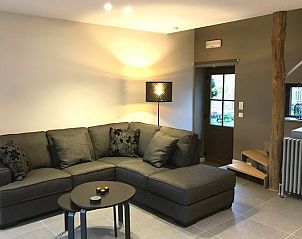 Gezellige woonkamer in Vakantiehuis in Riemst Millen, Limburg, Belgi met comfortabele zithoek en moderne inrichting.